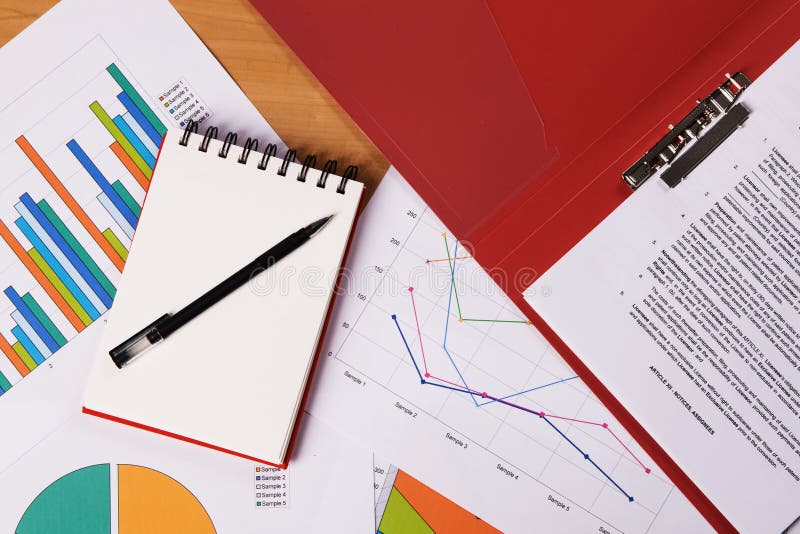 Work-table covered with documents