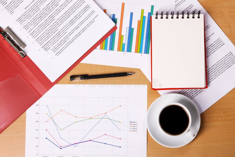 Work-table covered with documents