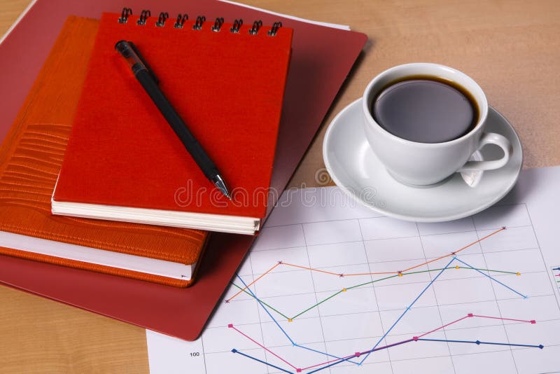 Work-table covered with documents