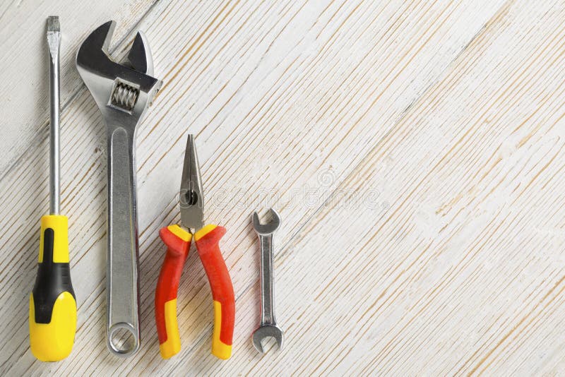 Work tools, different instrument on white wooden background stock photography Work tools, different instrument on white wooden background stock photography