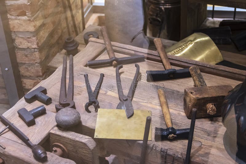 A Workbench with a Set of Antique Locksmith Tools. Stock Photo Image