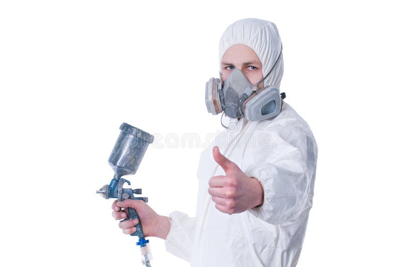 Worker with airbrush gun giving thumbs up