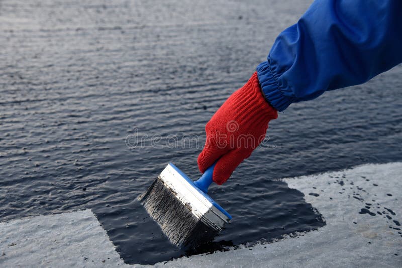 Worker Applies Bitumen Mastic on the Foundation Stock Image Image of