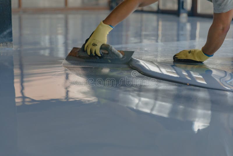 Worker Mixing Yellow Epoxy Resin with the Mixer Stock Image - Image of  floor, resin: 201816033