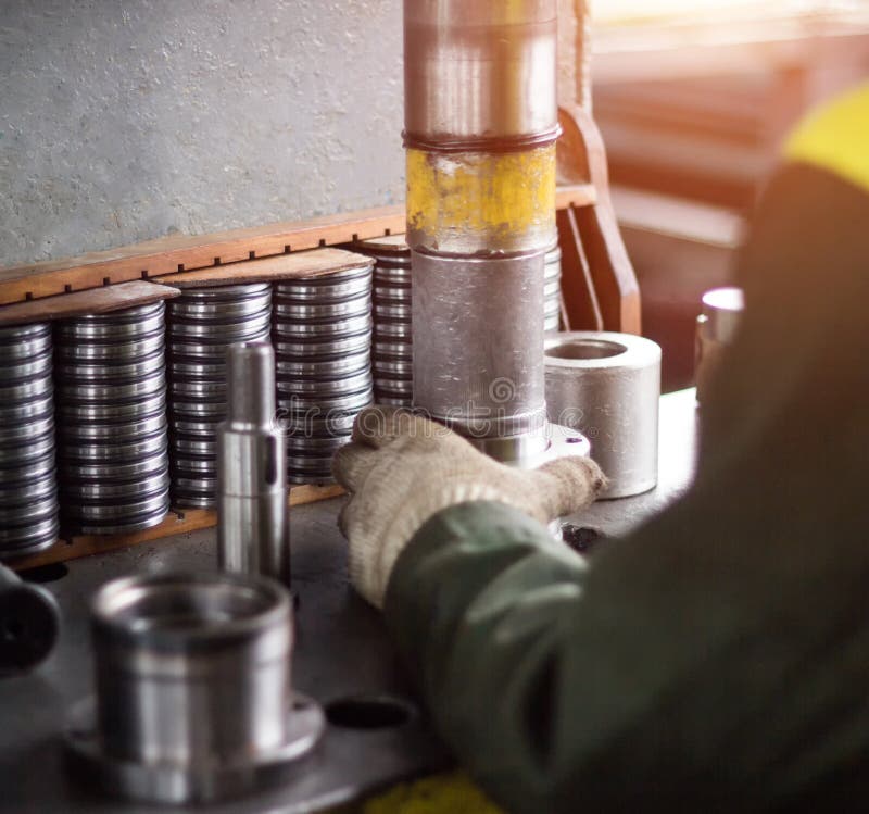 Pressing the Bearing into a Metal Holder, Press Machine, Closeup