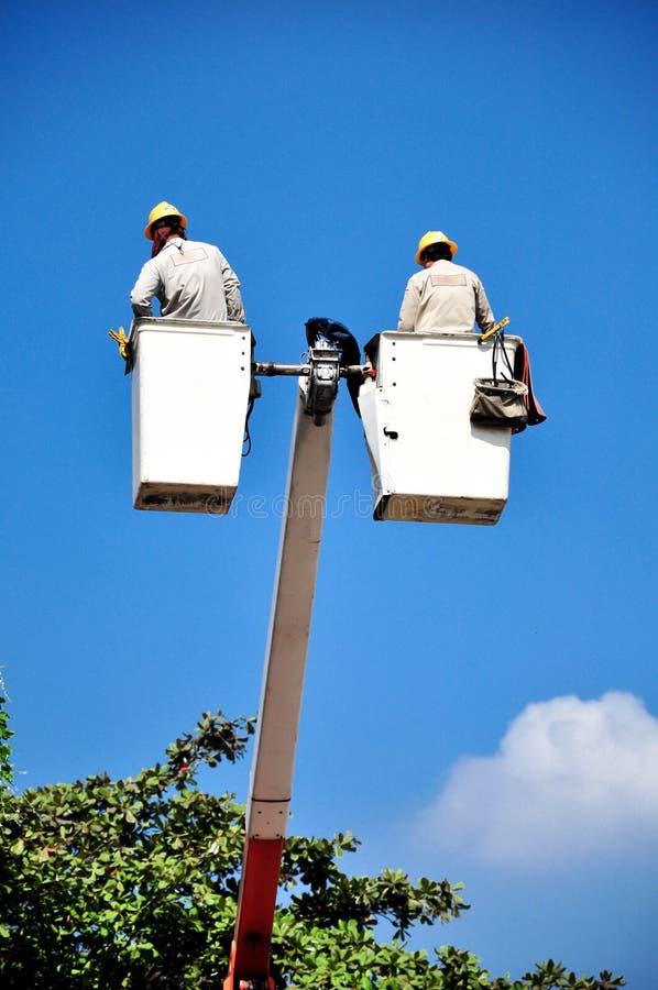 Worker in bucket stock image. Image of line, picker, electric 43790605