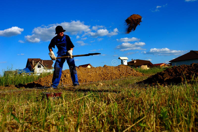 Worker build a foundation stock image. Image of village 46406457
