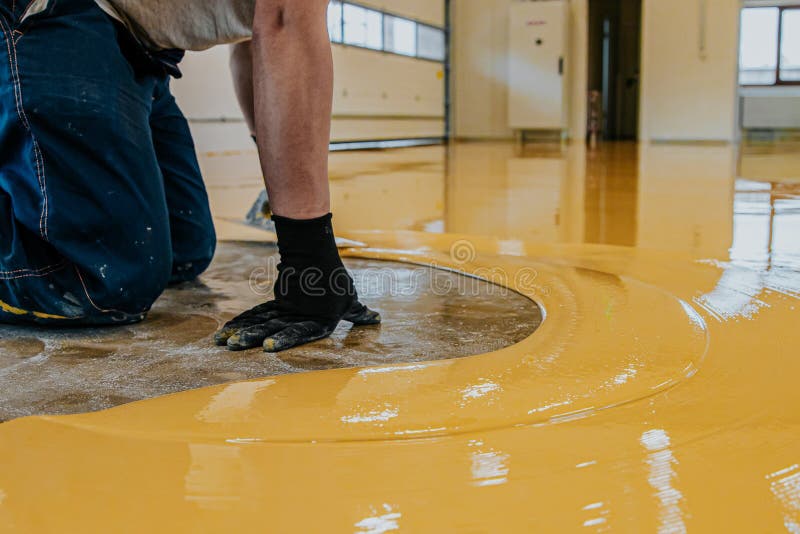 Feet Wearing Painters' Wooden Shoes Nails Self Leveling Epoxy