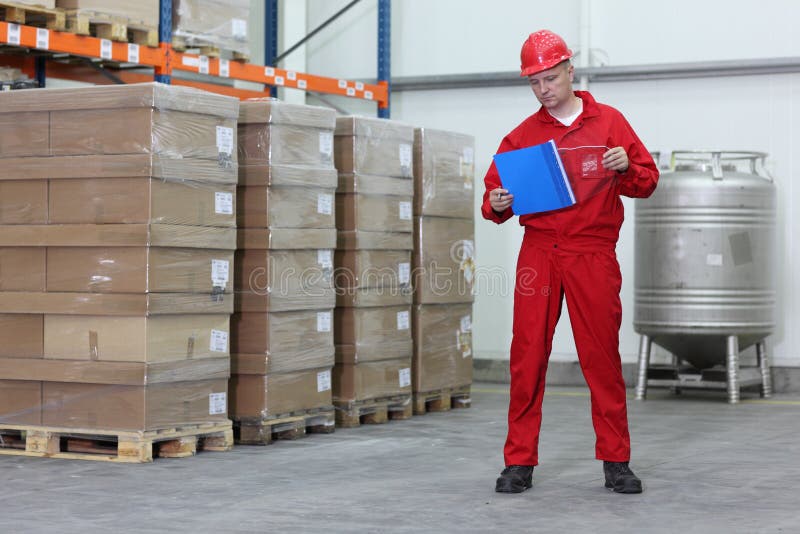 Worker in a company warehouse royalty free stock image Worker in a company warehouse royalty free stock image