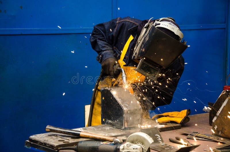 Man cutting iron stock photo. Image of technology, metal 109420844