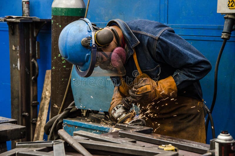 Man cutting iron stock photo. Image of technology, metal 109420844