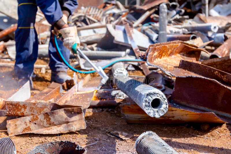 Worker is Cutting Scrap Metal with Acetylene Torch Stock Image - Image