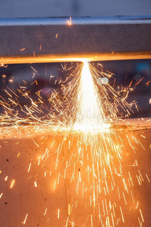 Worker Cutting Steel Pipe Using Metal Torch and Install Roadside Stock