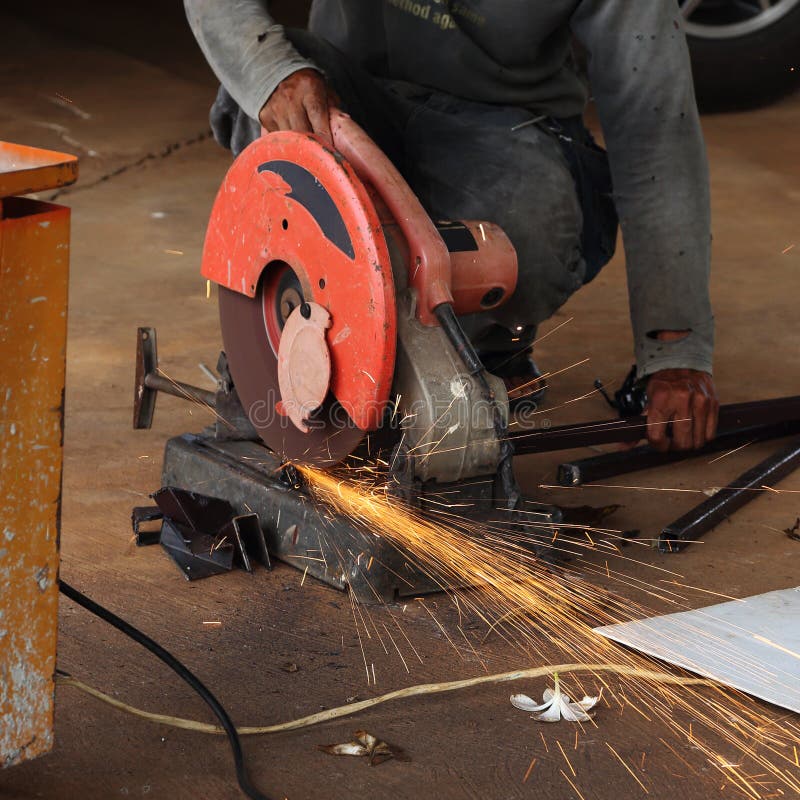 Worker cutting steel rod stock photo. Image of mill, engineering - 42546704