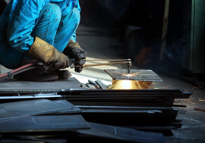 Worker cutting steel royalty free stock photo