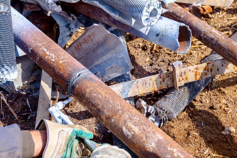 Worker is Cutting Scrap Metal with Acetylene Torch Stock Photo - Image