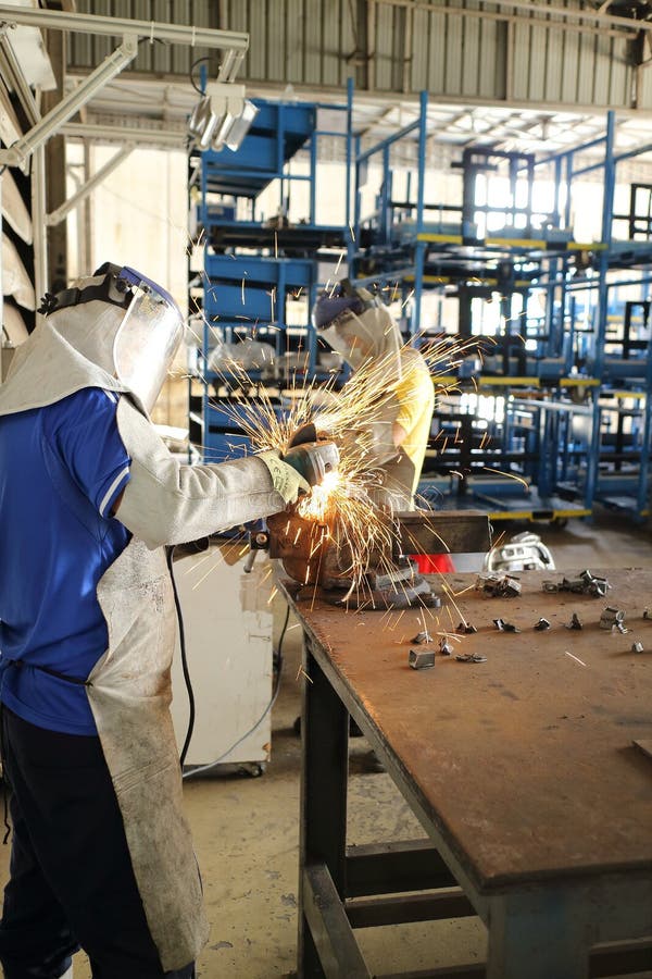 Worker grinding steel stock image. Image of iron, safety 61259239