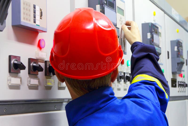 Worker in a helmet, the electrician royalty free stock image Worker in a helmet, the electrician royalty free stock image