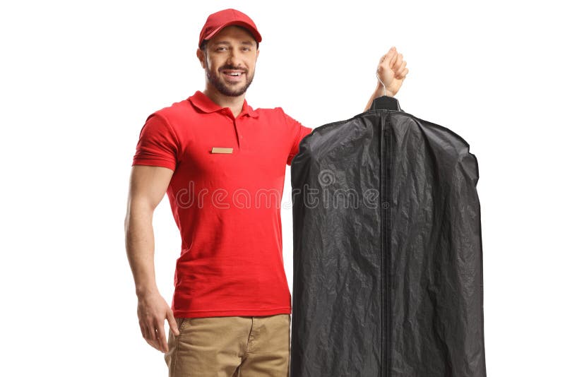 Worker holding clothes on a hanger inside a cover case royalty free stock photography