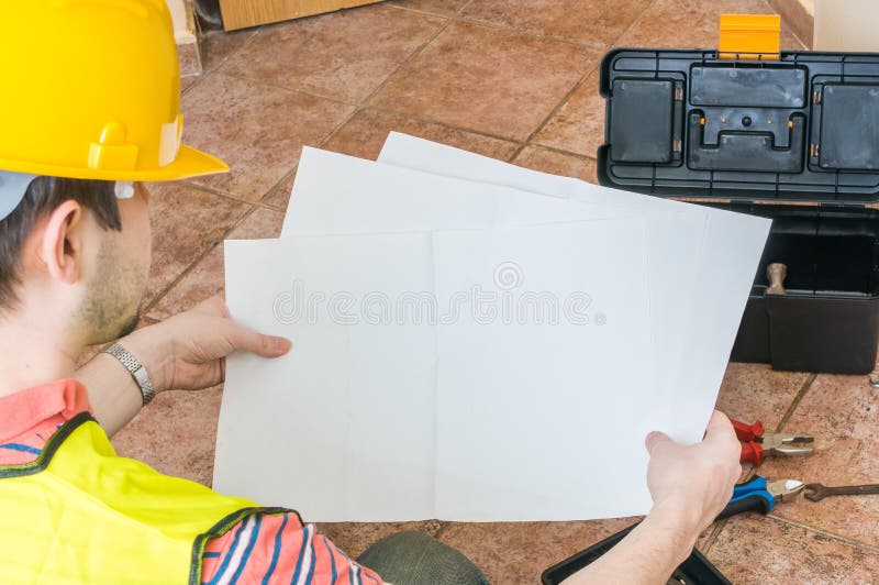 Worker is holding empty paper for custom message stock photos