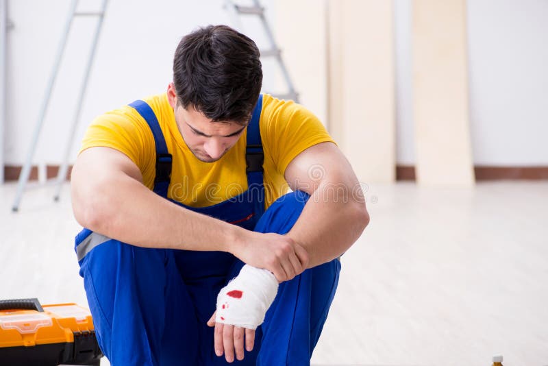 The Worker with Injured Hand at Construction Site Stock Image Image of emergency, physical