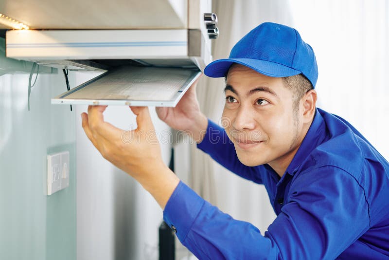 Worker Installing Cooker Hood Stock Photo Image of repairing, smiling