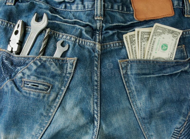 Worker jeans with money and tools