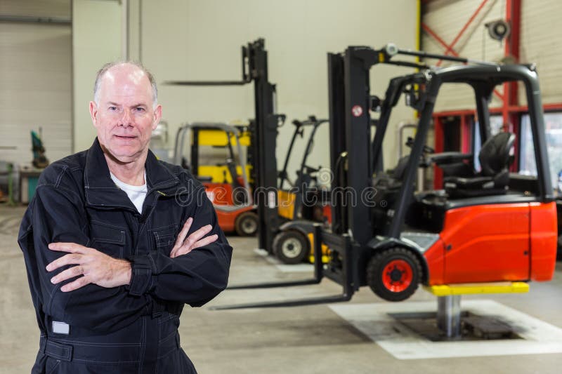 Forklift Mechanic with Clip Board Stock Image Image of friendly