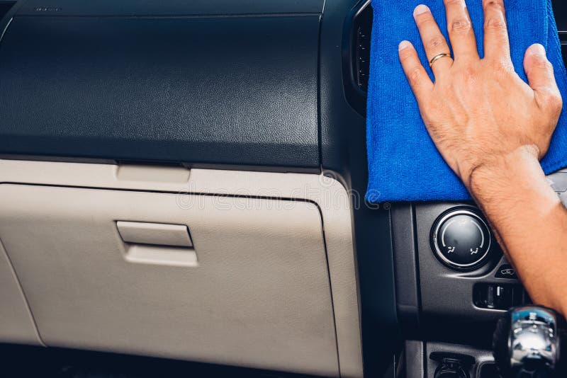 Worker Man Cleaning Dust Interior by Cloth Microfiber Inside Car Stock