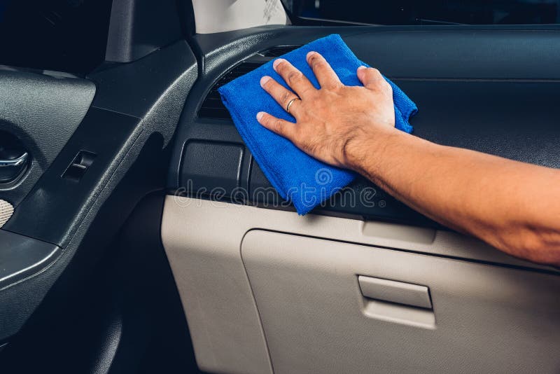 Worker Man Cleaning Dust Interior by Cloth Microfiber Inside Car Stock