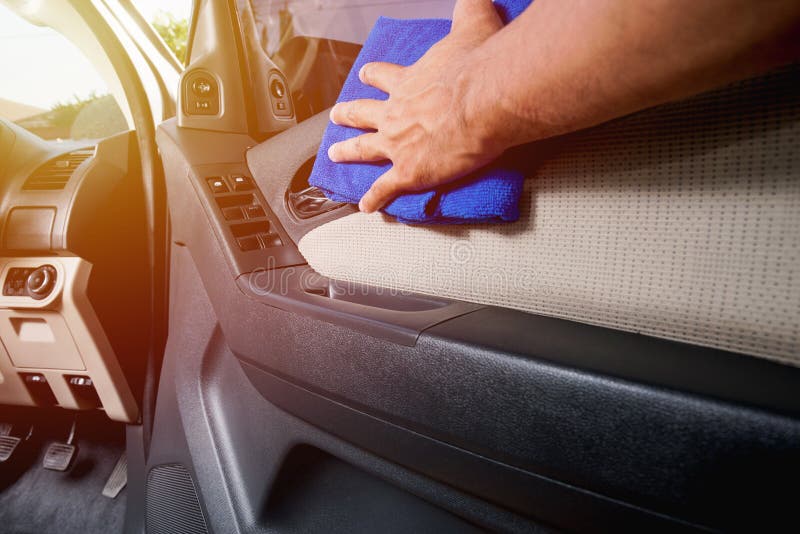 Worker Man Cleaning Dust Interior by Cloth Microfiber Inside Car Stock