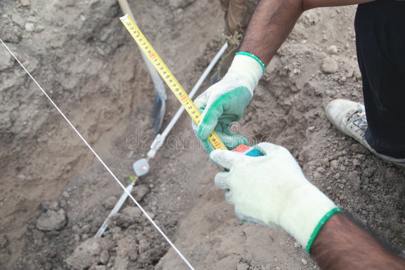 Worker Measuring a Hole of Soil Stock Image Image of natural, measure 230661233
