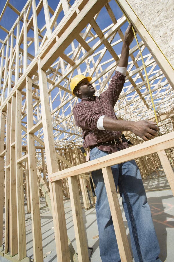 Worker Measuring Window Frame royalty free stock photo