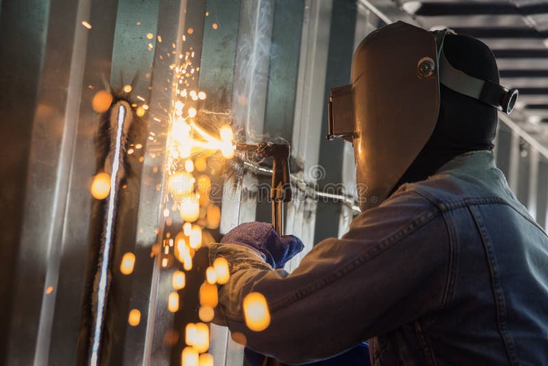 Worker and metal cutting royalty free stock photo