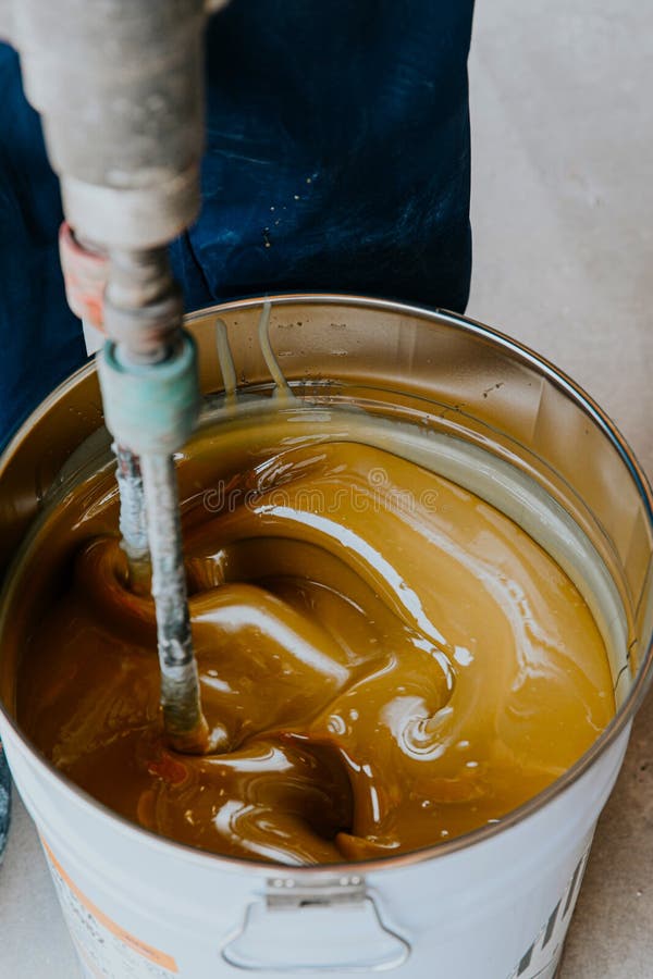 Worker Mixing Yellow Epoxy Resin with the Mixer Stock Image - Image of  floor, resin: 201816033