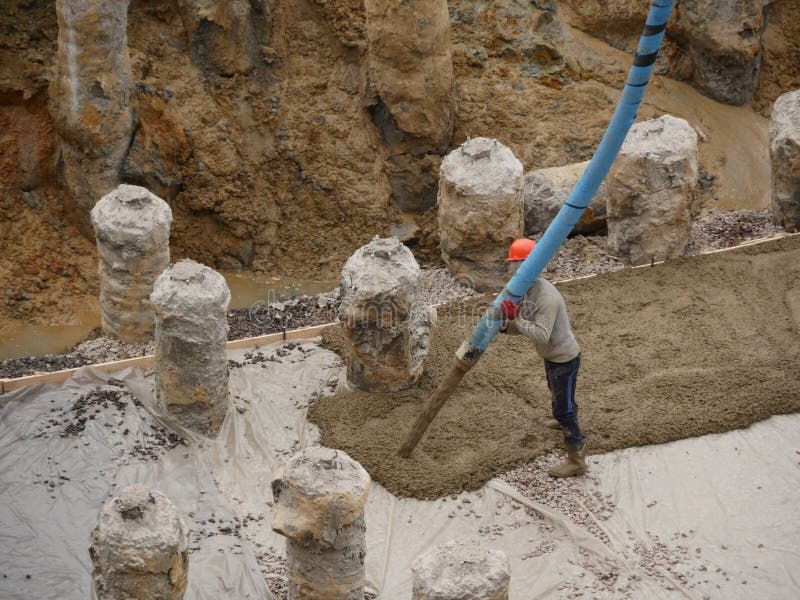 Worker with Pipe Pouring Concrete Stock Photo Image of work