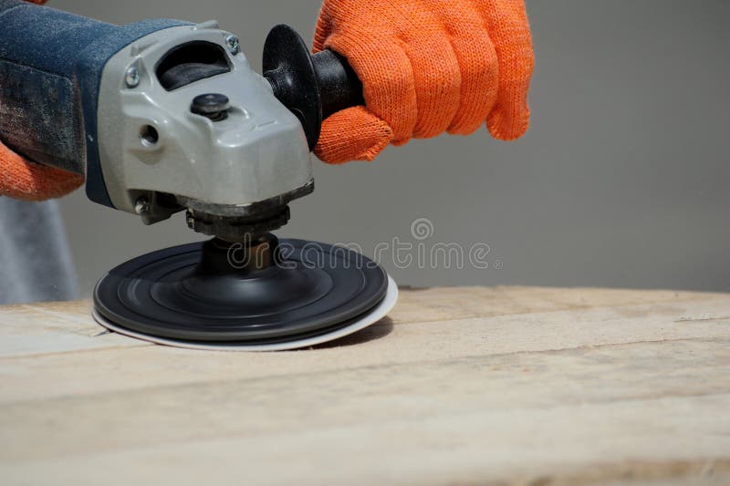 Worker Polishing a Wood Table. Closeup Stock Photo Image of grinder