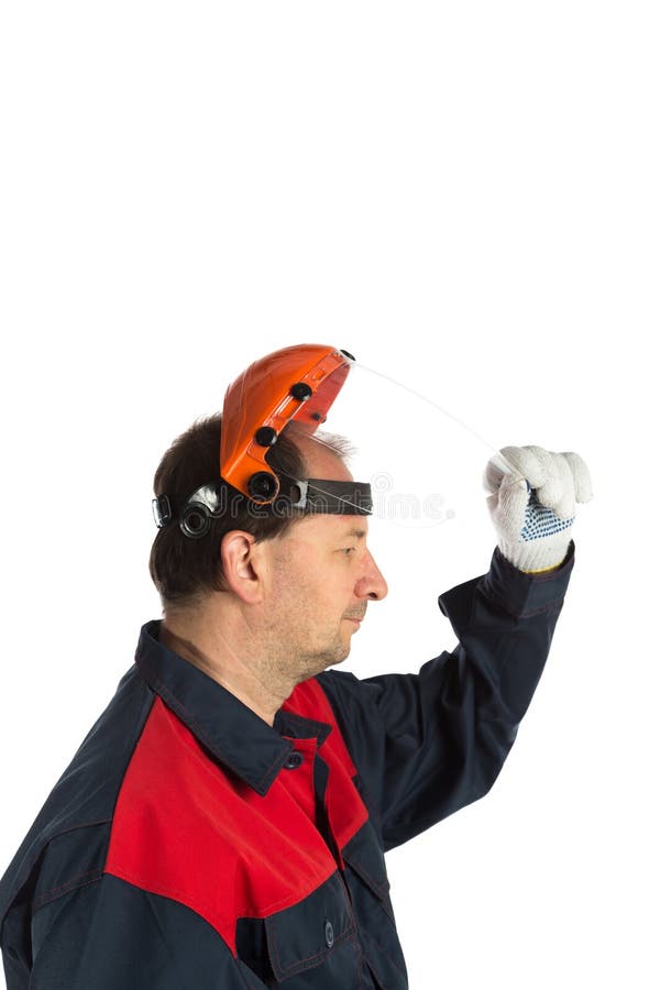 A worker in a protective mask. The image is highlighted on a white background. The case is made of orange plastic. Eye protection. Close-up. Selective focus. Side profile mask stock images, royalty-free photos and pictures