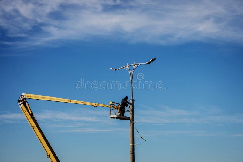 Worker Repair Street Lamp at Height Stock Image Image of illumination