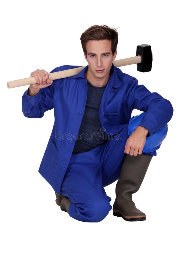 Worker with a sledgehammer stock image