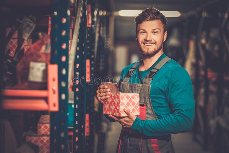 Worker in a Spare Parts Warehouse Stock Photo Image of spare, service