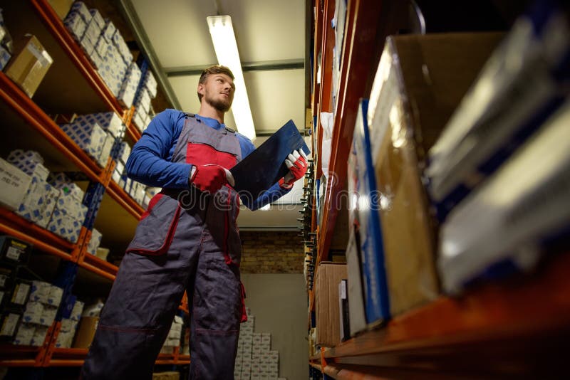 Worker in a Spare Parts Warehouse Stock Image Image of package