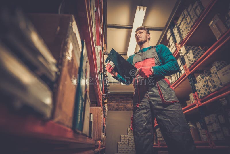 Worker on a Spare Parts Warehouse Stock Image Image of depot, shelves