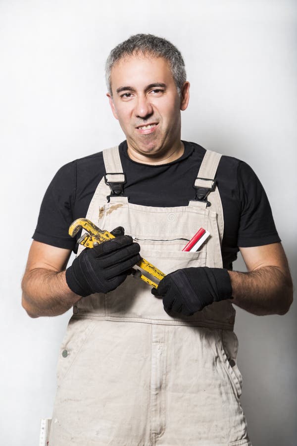 Caucasian Plumber Worker Wearing Safety Gloves Adjusting Water Sewage  Residential Stock Photo by ©welcomia 415928518