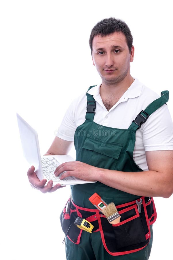 Worker in uniform with laptop isolated on white stock images