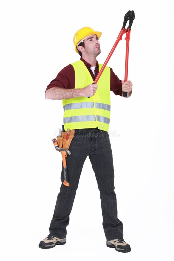 Worker using bolt cutters stock images