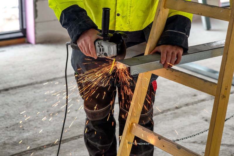Worker Using Grinding Machine Stock Photo Image of equipment, steel