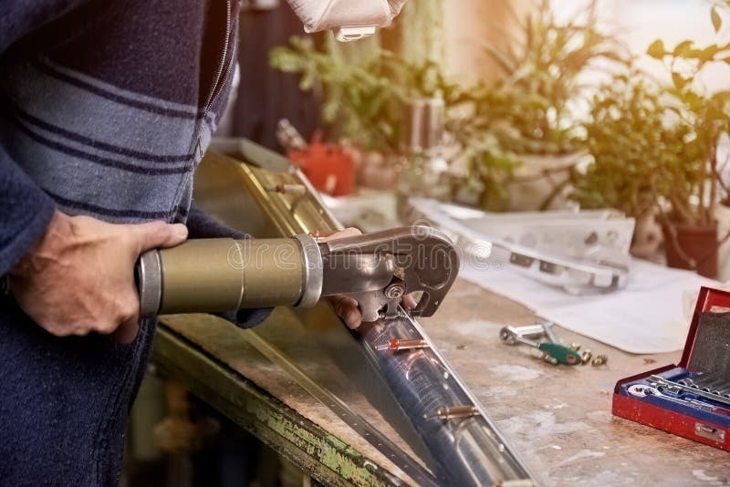 Worker is Using Rivet Squeezer. Stock Photo Image of metal, industry