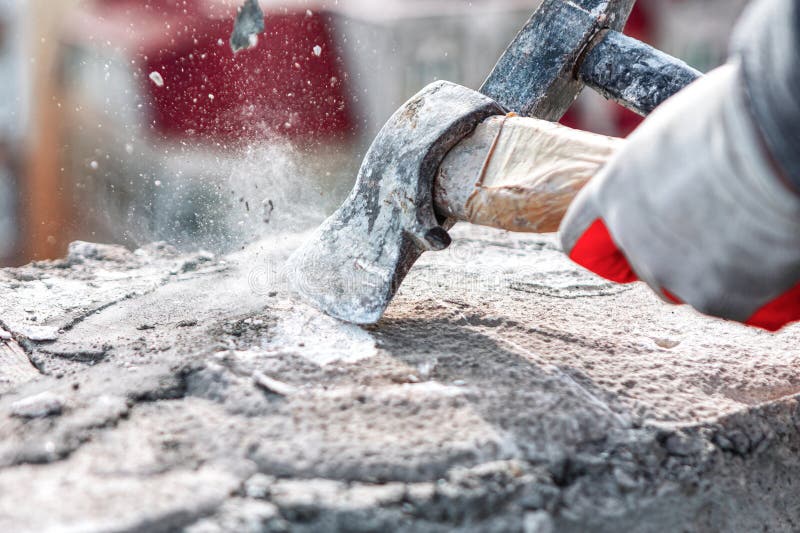 Worker Using a Sledgehammer To Cut a Stone Stock Image Image of gloves, equipment 318608021