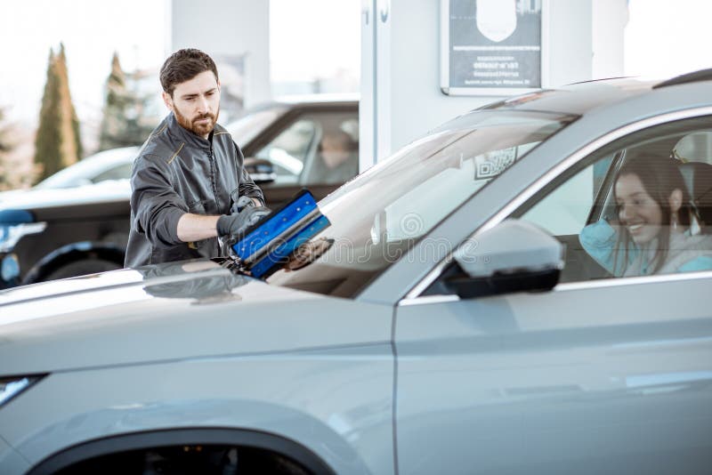 Worker Washing Car Windshield at the Station Stock Photo Image of